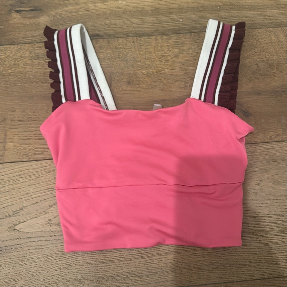 Free people movement pink ruffle top